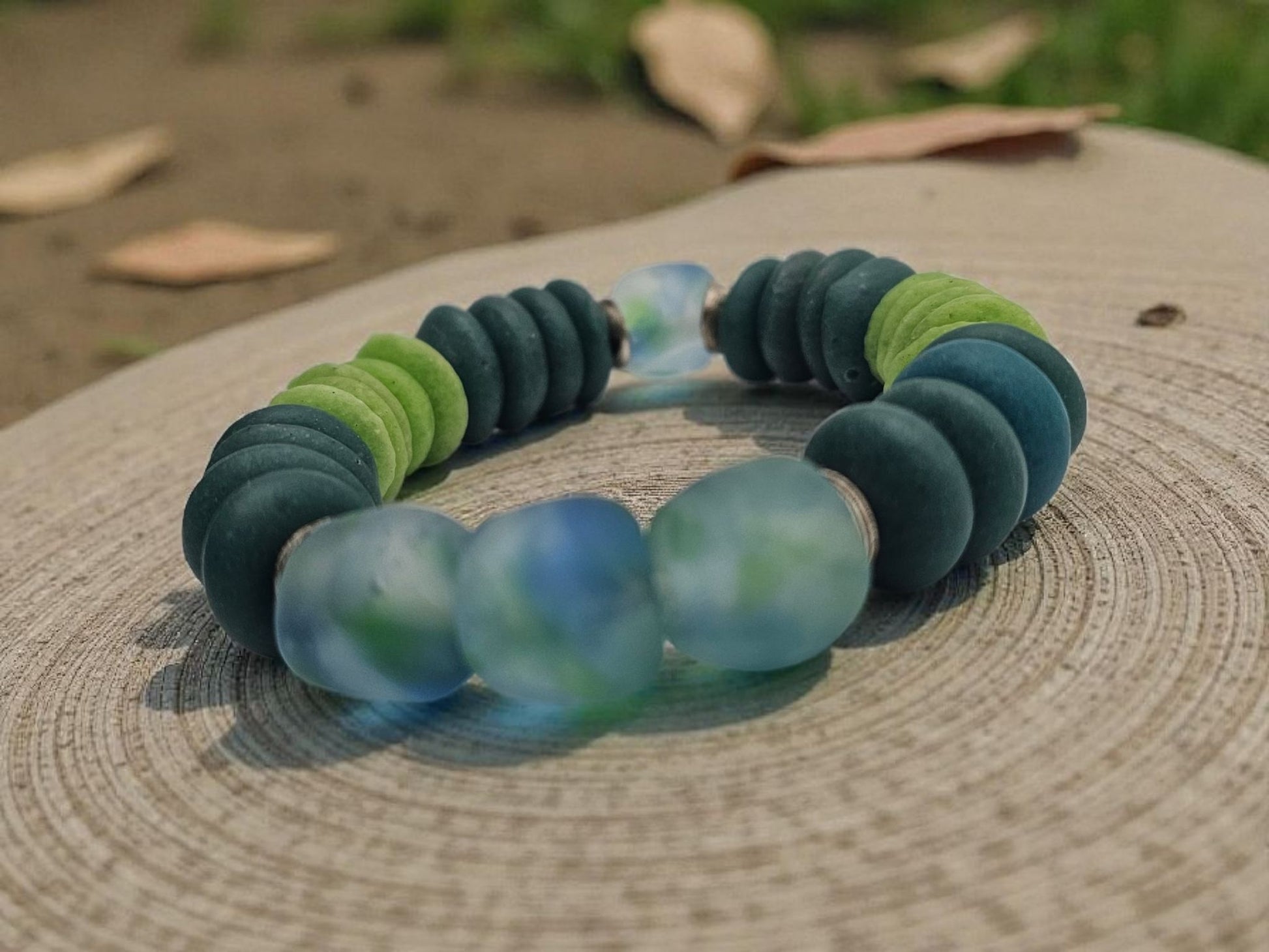 Multi Color Ashanti Blue Green Glass Beaded Bracelet featuring vibrant, handcrafted African trade beads in a bold, spiritual design. This colorful boho statement bracelet is inspired by traditional Ashanti craftsmanship, blending rich cultural heritage with modern style. Perfect handmade jewelry gift for women who love unique, meaningful accessories. Ideal for birthdays, holidays, or special occasions. A stunning piece full of color, energy, and artisan charm.