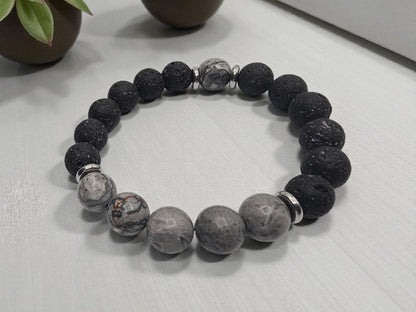 Jasper Lava Stone Diffuser Bracelet handcrafted for men, featuring natural jasper and porous lava stones perfect for essential oil diffusion. This chakra-inspired jewelry piece promotes balance, grounding, and positive energy while allowing personalized aromatherapy on the go. Adjustable and durable, it’s ideal for everyday wear, meditation, or mindfulness practices. A thoughtful gift for men who appreciate handmade jewelry, wellness accessories, and stylish, meaningful gemstone bracelets.