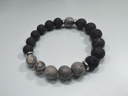 Jasper Lava Stone Diffuser Bracelet handcrafted for men, featuring natural jasper and porous lava stones perfect for essential oil diffusion. This chakra-inspired jewelry piece promotes balance, grounding, and positive energy while allowing personalized aromatherapy on the go. Adjustable and durable, it’s ideal for everyday wear, meditation, or mindfulness practices. A thoughtful gift for men who appreciate handmade jewelry, wellness accessories, and stylish, meaningful gemstone bracelets.