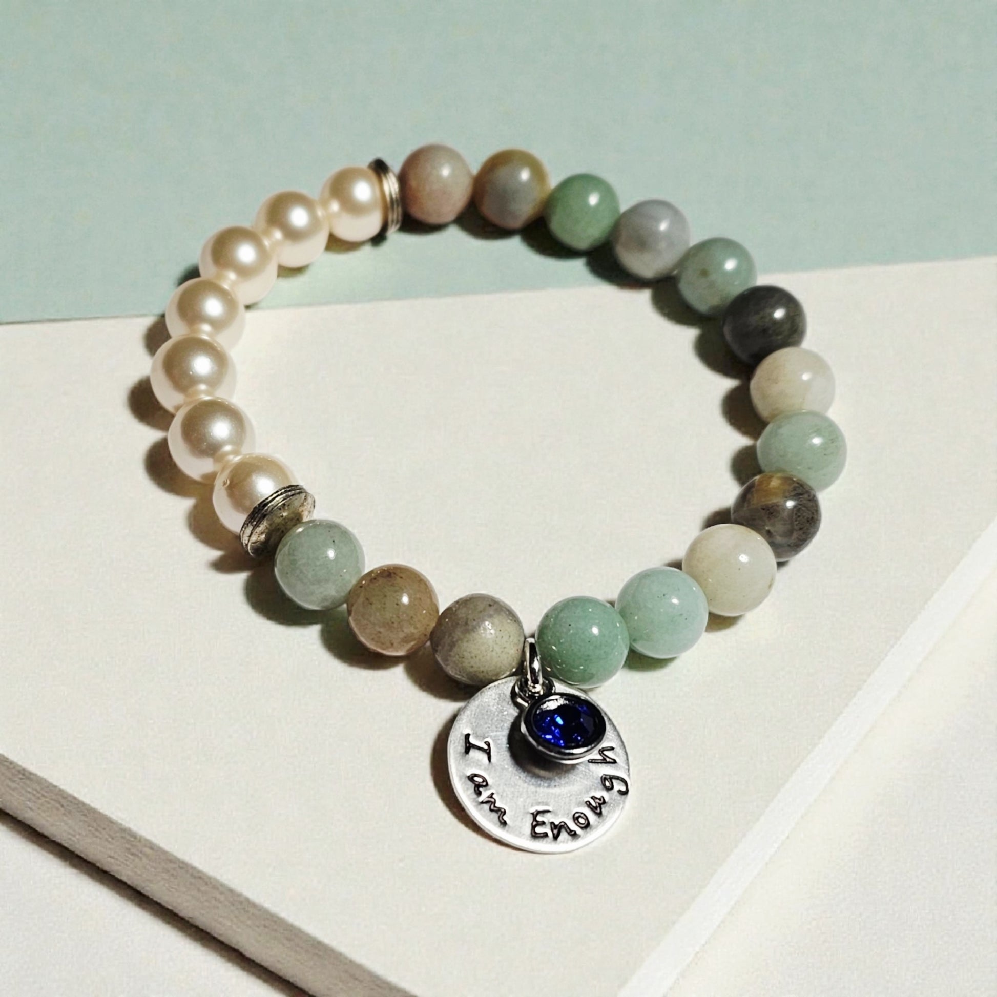 Agate Freshwater Pearl Bracelet designed as an inspirational healing accessory for women, combining green agate stones with delicate freshwater pearls. This empowering zodiac jewelry piece promotes balance, positivity, and emotional strength, making it a thoughtful gift for her. Perfect for daily wear or special occasions, the bracelet blends natural beauty with meaningful symbolism. Stylish and versatile, it complements both casual and elegant outfits.