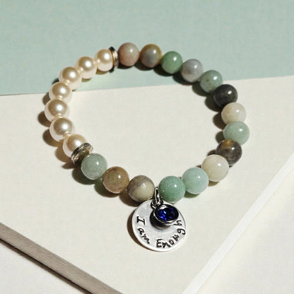 Agate Freshwater Pearl Bracelet designed as an inspirational healing accessory for women, combining green agate stones with delicate freshwater pearls. This empowering zodiac jewelry piece promotes balance, positivity, and emotional strength, making it a thoughtful gift for her. Perfect for daily wear or special occasions, the bracelet blends natural beauty with meaningful symbolism. Stylish and versatile, it complements both casual and elegant outfits.