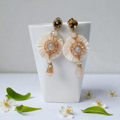 Statement Crystal Drop Earrings featuring handmade beaded design with sparkling crystal dangles, perfect for women who love elegant and unique jewelry. These artisanal earrings combine shimmer and craftsmanship to create a bold accessory ideal for weddings, parties, or everyday glam. Lightweight and eye-catching, they make a thoughtful gift for women or bridesmaids, adding a touch of sophistication and charm to any outfit with their radiant, handcrafted beauty.