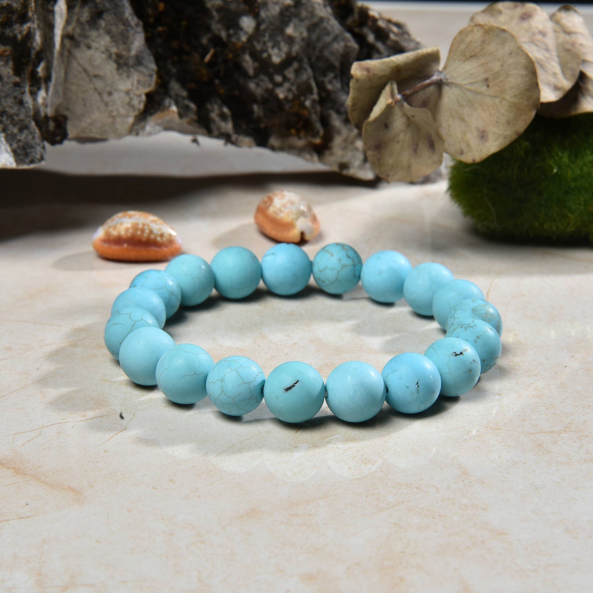 Magnesite Turquoise Stretch Bracelet designed for women and men, featuring blue stone beads known for their healing and chakra-balancing properties. This handcrafted boho crystal jewelry offers both style and spiritual energy, perfect for those seeking natural wellness accessories. Lightweight and comfortable, it makes a thoughtful gift that promotes calmness, positivity, and balance. Ideal for everyday wear, meditation, or adding a vibrant, earthy touch to any outfit.