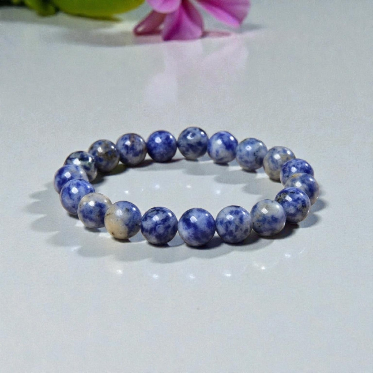 Handmade Sodalite Bracelet featuring natural healing crystals, designed as a mala bead chakra bracelet for meditation and spiritual balance. This Dumortierite-infused jewelry piece promotes calm, clarity, and emotional healing, suitable for both men and women. Perfect as a meaningful gift for mindfulness practitioners, yoga lovers, or anyone seeking positive energy. Stylish, durable, and crafted with care for everyday wear or meditation sessions.