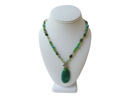 Amazonite, Jasper, and Quartz Multi-Stone Necklace featuring a unique Russian pendant design, handcrafted into a bold boho statement necklace for women. This green-toned jewelry piece blends natural gemstones to create a vibrant accessory full of healing energy and artistic charm. Perfect as a handmade gift for her, it adds a distinctive touch to any outfit, ideal for everyday wear or special occasions, combining artisanal craftsmanship with natural beauty.