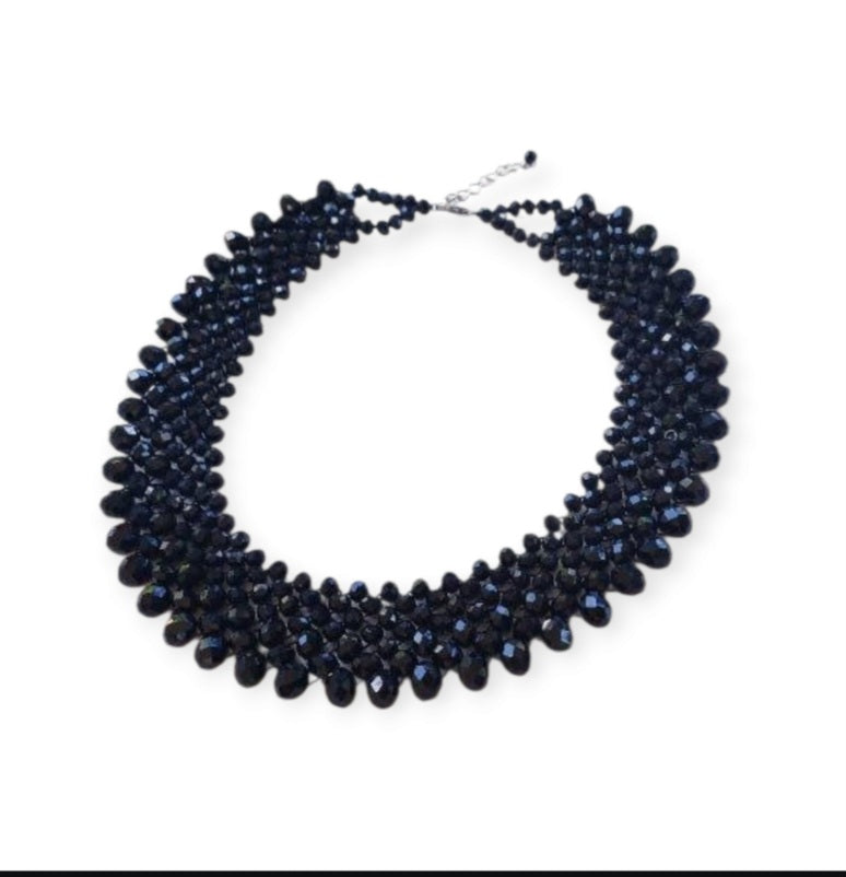 Black Crystal Handmade Necklace designed as a chunky statement piece with a bold, vintage-inspired look. This short choker-style necklace features faceted black crystals that catch the light beautifully, making it perfect for women who love dramatic, elegant jewelry. Ideal for evening wear, special events, or as a unique gift for her, this handcrafted piece adds a touch of gothic glamour and timeless sophistication to any outfit, blending classic style with modern artistry.