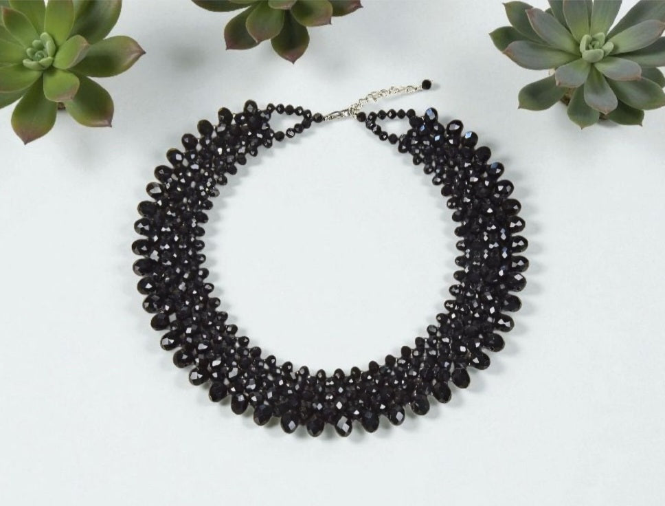 Black Crystal Handmade Necklace designed as a chunky statement piece with a bold, vintage-inspired look. This short choker-style necklace features faceted black crystals that catch the light beautifully, making it perfect for women who love dramatic, elegant jewelry. Ideal for evening wear, special events, or as a unique gift for her, this handcrafted piece adds a touch of gothic glamour and timeless sophistication to any outfit, blending classic style with modern artistry.