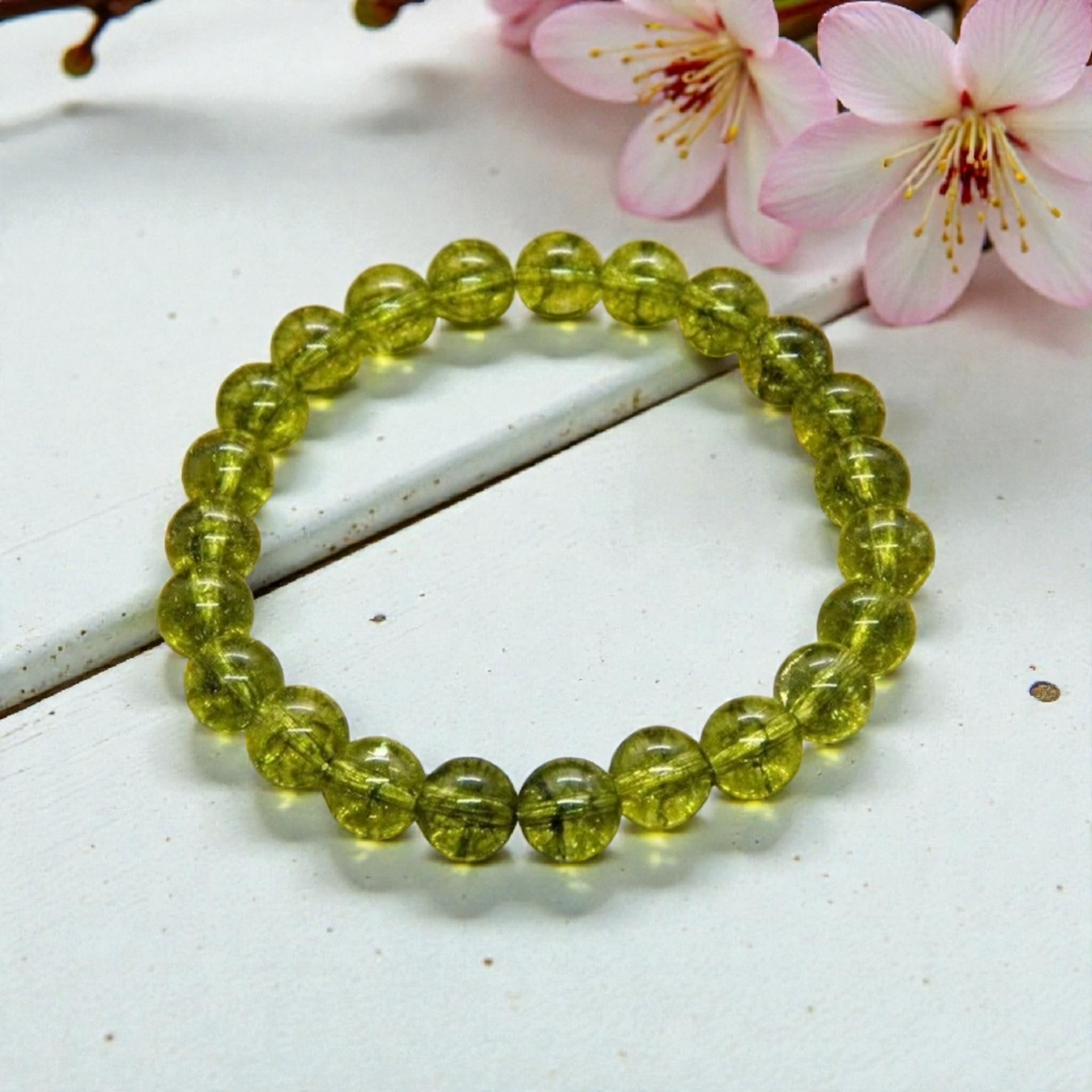Peridot handmade gemstone healing bracelet featuring natural green peridot stones carefully strung for a balanced and elegant look. Known as a stone of positivity, renewal, and emotional healing, this bracelet offers both beauty and meaning. Designed for everyday wear, it complements boho, minimalist, and spiritual styles. A thoughtful gift for women who appreciate crystal healing jewelry, handcrafted accessories, and vibrant natural gemstones with calming, uplifting energy.