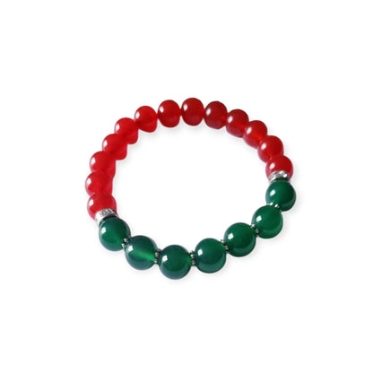 Green and Red Onyx Crystal Bracelet featuring handmade beaded design crafted for both women and men. This lucky charm jewelry combines vibrant green and deep red onyx stones, known for promoting abundance, protection, and positive energy. Perfect as a meaningful gift for him or her, this stylish bracelet blends artisanal craftsmanship with spiritual benefits. Lightweight and versatile, it adds a powerful and elegant touch to everyday wear or special occasions.