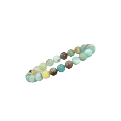 Crystal Handmade Beaded Amazonite Bracelet featuring natural stones crafted into a chakra lucky charm bracelet for both women and men. This spiritual energy jewelry combines soothing amazonite beads known for calming and balancing properties with artisanal beadwork. Lightweight and versatile, it makes a meaningful gift for anyone seeking positive energy, healing, and style. Perfect for everyday wear or meditation, blending natural beauty with holistic wellness.