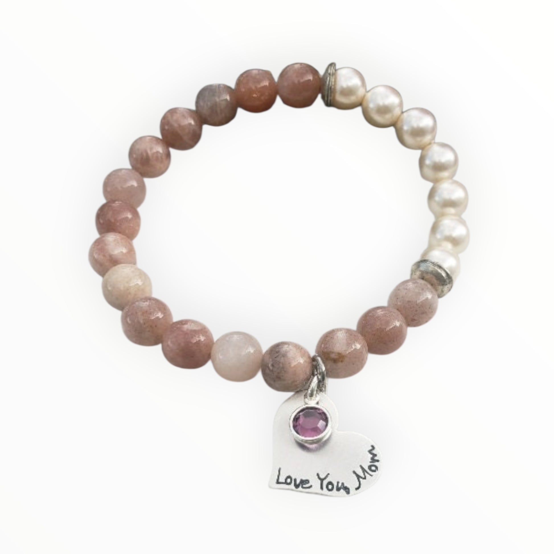 Sunstone pearl bracelet handcrafted with warm sunstone gemstones, luminous freshwater pearls, and a sterling silver charm for a boho-inspired, radiant look. This meaningful jewelry piece symbolizes joy, confidence, and positive energy, making it ideal for everyday wear or special occasions. A thoughtful gift for women who love natural stone jewelry, beachy style, or spiritual accessories, perfect for birthdays, anniversaries, holidays, or self-care gifting.