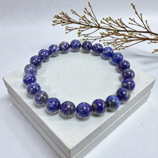 Blue Lapis Lazuli stretch bracelet for men and women, made with natural stones known for their healing and protective properties. This spiritual energy bracelet promotes mental clarity, inner peace, and positive energy. Handcrafted with care, it’s a versatile accessory that combines style and meaning, perfect as a thoughtful gift for those seeking protection, balance, and enhanced spiritual well-being in daily life.