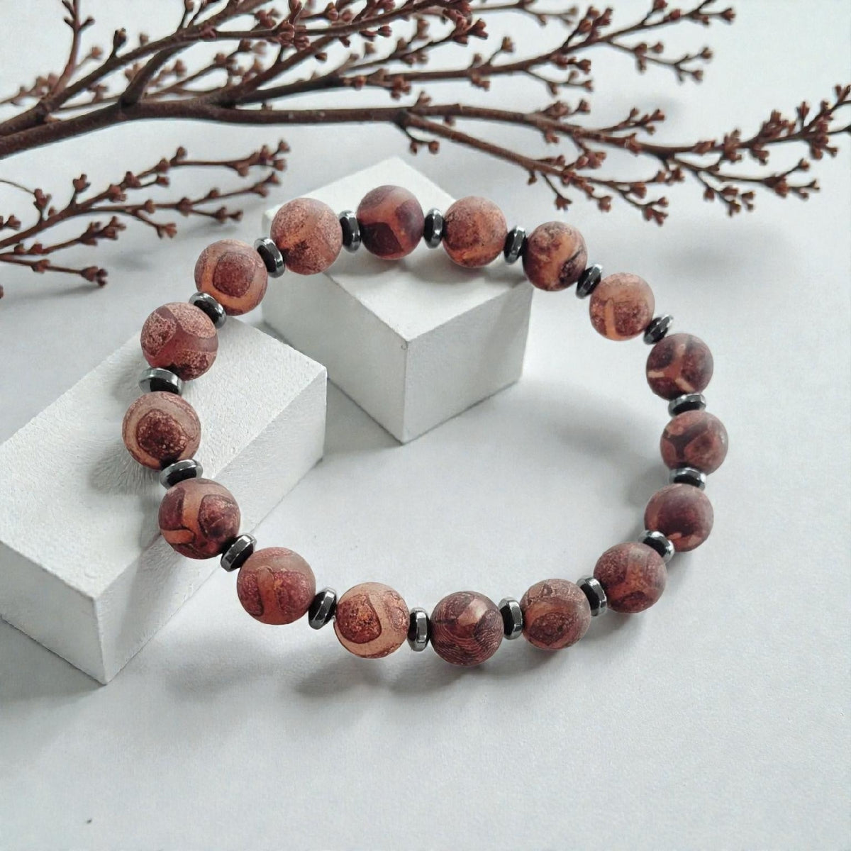 Tibetan Agate Bracelet for Men and Women – a handmade brown crystal healing bracelet featuring natural agate beads known for their grounding and protective energy. This spiritual beaded bracelet enhances balance, inner strength, and emotional healing. A thoughtful gift for him or her, perfect for meditation, daily wear, or spiritual practices. Unique handcrafted agate jewelry with timeless boho charm