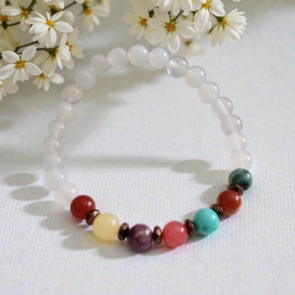 Handmade bracelet featuring opal, agate, and jade gemstones designed for chakra healing, balance, and positive energy. This crystal beaded jewelry piece blends natural beauty with spiritual meaning, making it a thoughtful gift for meditation lovers, yoga enthusiasts, or anyone seeking calm and harmony. Perfect for daily wear or special occasions, this healing stone bracelet offers a meaningful accessory that supports mindfulness, wellness, and personal intention.