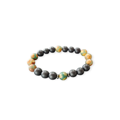 Handmade Tibetan-style black onyx and agate bracelet featuring healing gemstones known for their protective and grounding properties. This men’s lucky charm jewelry piece blends traditional craftsmanship with modern style, making it an ideal gift for him. Perfect for everyday wear or special occasions, the bracelet offers both spiritual benefits and a bold, masculine accessory that complements any outfit with its sleek black design.