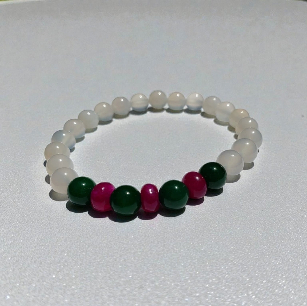 Natural White Opal and Jade Beaded Bracelet featuring 8mm stretch beads crafted for women who appreciate elegant, handmade jewelry. This lucky charm bracelet combines shimmering white opal with soothing jade stones, symbolizing balance, protection, and positive energy. Perfect gift for her on birthdays, anniversaries, or special occasions. A beautiful, versatile accessory that blends spiritual healing with stylish, artisanal craftsmanship.