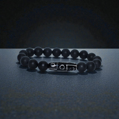 Black Onyx Bracelet with Tibetan Agate accents featuring 10mm stretch beads designed for men who appreciate spiritual healing and stylish jewelry. This handcrafted bracelet combines powerful black onyx stones with earthy agate for balance, protection, and grounding energy. Ideal as a meaningful gift for him, it blends durability and comfort with a sleek, masculine design—perfect for everyday wear, meditation, or enhancing personal style with natural healing properties.