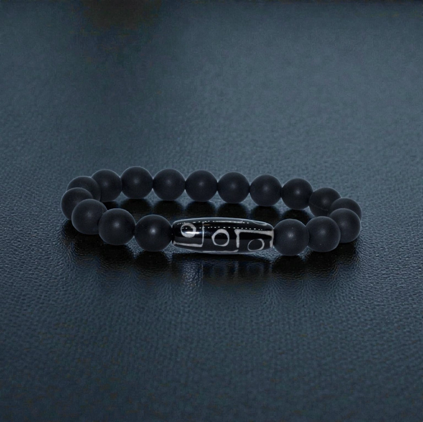 Black Onyx Bracelet with Tibetan Agate accents featuring 10mm stretch beads designed for men who appreciate spiritual healing and stylish jewelry. This handcrafted bracelet combines powerful black onyx stones with earthy agate for balance, protection, and grounding energy. Ideal as a meaningful gift for him, it blends durability and comfort with a sleek, masculine design—perfect for everyday wear, meditation, or enhancing personal style with natural healing properties.