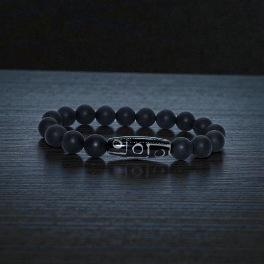 Black Onyx Bracelet with Tibetan Agate accents featuring 10mm stretch beads designed for men who appreciate spiritual healing and stylish jewelry. This handcrafted bracelet combines powerful black onyx stones with earthy agate for balance, protection, and grounding energy. Ideal as a meaningful gift for him, it blends durability and comfort with a sleek, masculine design—perfect for everyday wear, meditation, or enhancing personal style with natural healing properties.