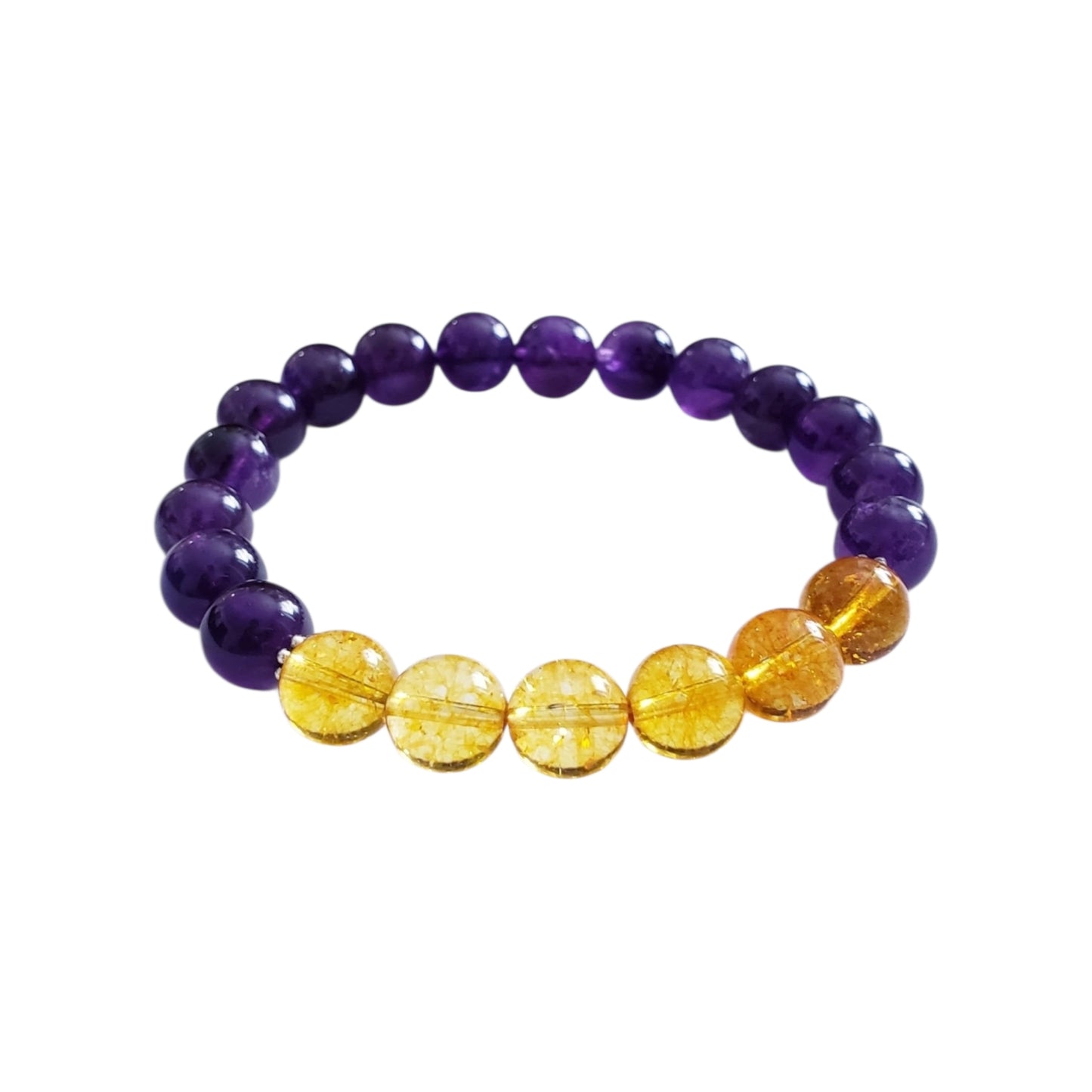 Amethyst and Citrine Crystal Bracelet for women, handcrafted with natural gemstones known for healing and positive energy. This inspirational bracelet combines the calming purple hues of amethyst with the vibrant yellow of citrine, promoting balance, clarity, and optimism. Handmade with care, it’s an ideal gift for anyone seeking spiritual wellness and stylish crystal jewelry. Perfect for everyday wear or special occasions to uplift mood and energy.