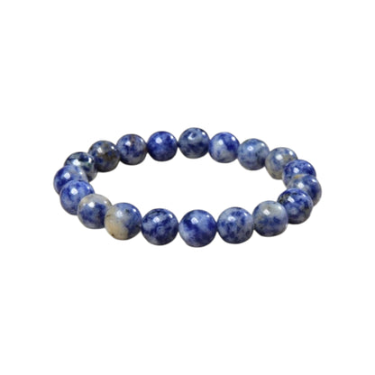 Handmade Sodalite Bracelet featuring natural healing crystals, designed as a mala bead chakra bracelet for meditation and spiritual balance. This Dumortierite-infused jewelry piece promotes calm, clarity, and emotional healing, suitable for both men and women. Perfect as a meaningful gift for mindfulness practitioners, yoga lovers, or anyone seeking positive energy. Stylish, durable, and crafted with care for everyday wear or meditation sessions.