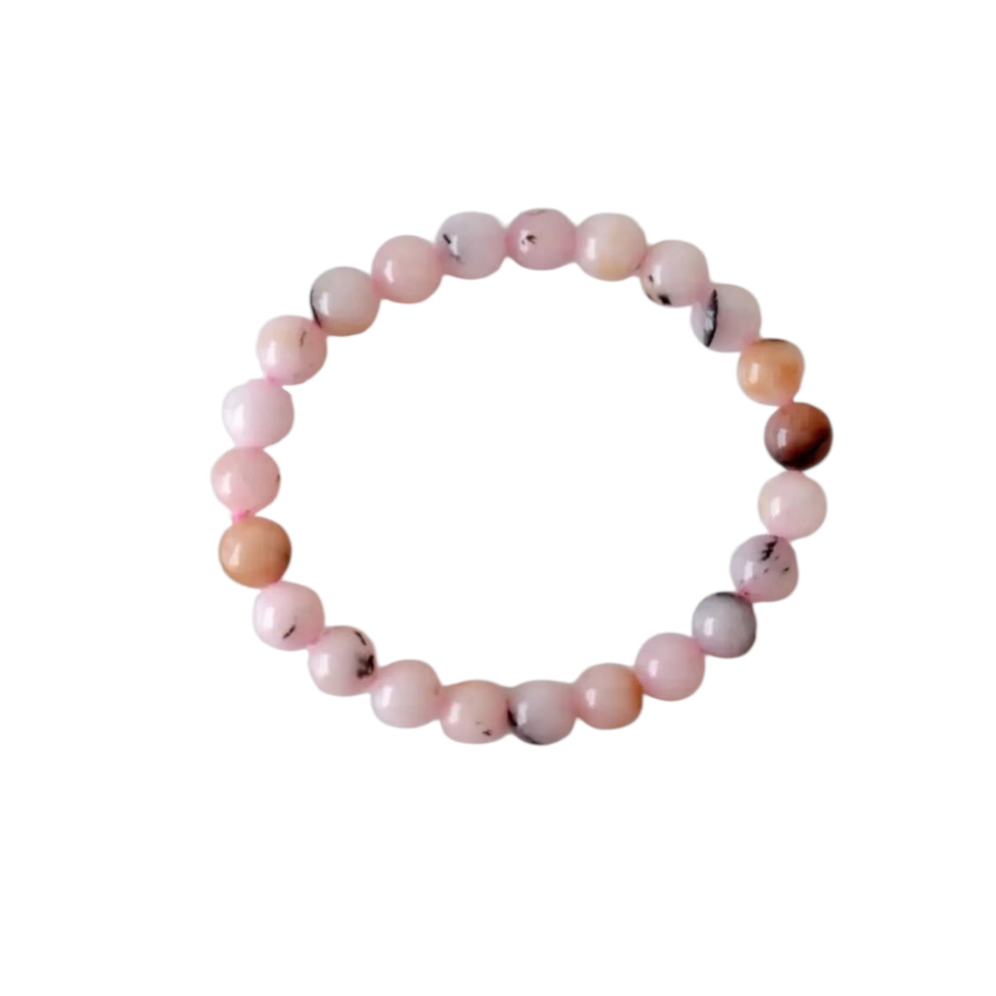 Pink Opal Bracelet featuring natural stone beads handcrafted into a soft pink crystal gemstone design, perfect for women who love healing and elegant jewelry. This delicate bracelet promotes emotional healing, love, and calm energy, making it an ideal gift for her or a thoughtful bridesmaid bracelet. Lightweight and feminine, it blends artisanal craftsmanship with the gentle beauty of pink opal, suitable for everyday wear or meaningful special occasions.