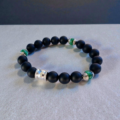 Natural Jade and Black Onyx Bracelet handcrafted as a men’s lucky charm and protection armband. This healing jewelry piece combines smooth jade and powerful black onyx stones, designed for strength, balance, and spiritual protection. Perfect handmade gift for him, ideal for birthdays, anniversaries, or wellness gifts. Stylish and meaningful, this men’s stretch bracelet blends natural energy with everyday wearable craftsmanship.