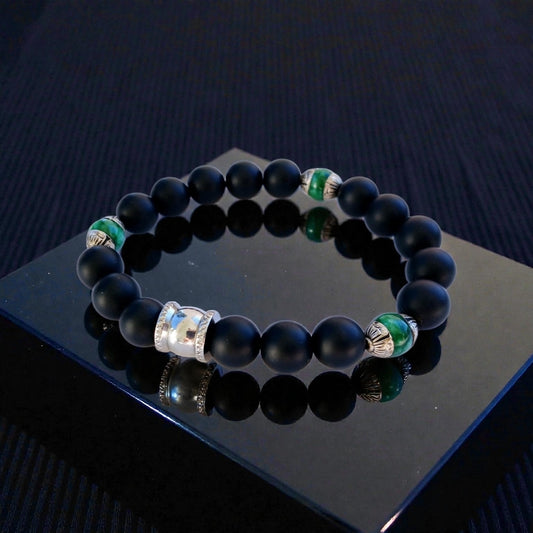 Natural Jade and Black Onyx Bracelet handcrafted as a men’s lucky charm and protection armband. This healing jewelry piece combines smooth jade and powerful black onyx stones, designed for strength, balance, and spiritual protection. Perfect handmade gift for him, ideal for birthdays, anniversaries, or wellness gifts. Stylish and meaningful, this men’s stretch bracelet blends natural energy with everyday wearable craftsmanship.