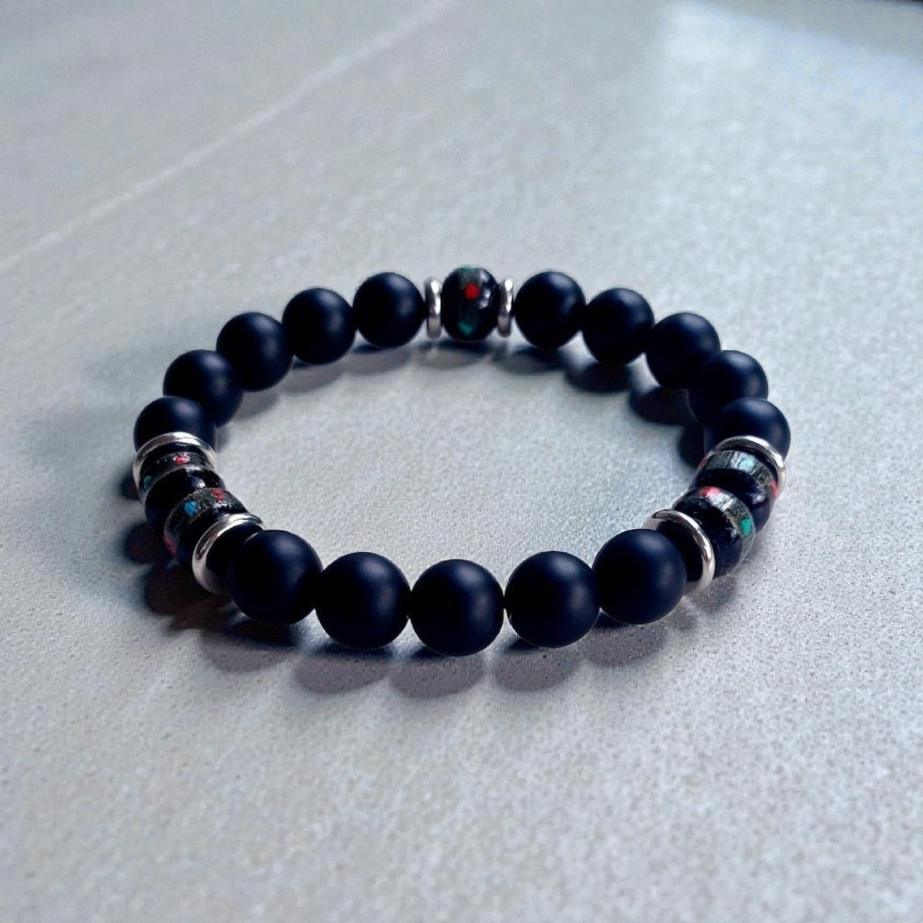 Handcrafted Onyx Bracelet for Men featuring yak bone, natural stone, and black lava beads. This minimalist Tibetan protection bracelet offers spiritual grounding and energy balance. Stylish yet meaningful, the black charm jewelry makes a unique handmade gift for men. Ideal for daily wear or special occasions, it combines tradition and modern design. Perfect men’s accessory for wellness, mindfulness, and style.