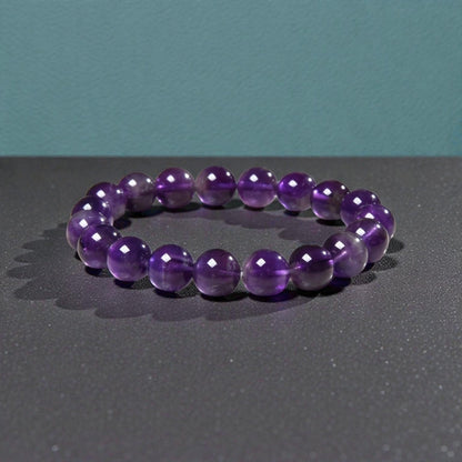 Amethyst stretch bracelet handcrafted with natural amethyst stones, designed to promote calming and spiritual energy. This versatile crystal bracelet supports relaxation, emotional balance, and mindfulness, making it ideal for meditation, yoga, or everyday wear. A thoughtful gift for women, friends, or loved ones seeking healing crystal jewelry, it combines stylish boho aesthetics with meaningful energy for wellness, self-care, and spiritual connection.