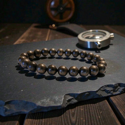 Good Luck Pyrite Bracelet featuring handmade crystal beads designed to attract abundance and positive spiritual energy. This unisex bracelet combines shimmering pyrite stones with artisanal craftsmanship, making it a meaningful gift for both women and men. Lightweight and stylish, it promotes confidence, prosperity, and protection. Perfect for everyday wear or meditation, this abundance bracelet blends healing properties with modern boho jewelry aesthetics.