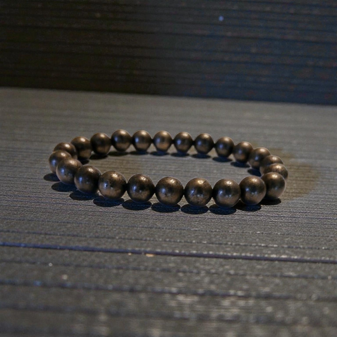 Good Luck Pyrite Bracelet featuring handmade crystal beads designed to attract abundance and positive spiritual energy. This unisex bracelet combines shimmering pyrite stones with artisanal craftsmanship, making it a meaningful gift for both women and men. Lightweight and stylish, it promotes confidence, prosperity, and protection. Perfect for everyday wear or meditation, this abundance bracelet blends healing properties with modern boho jewelry aesthetics.