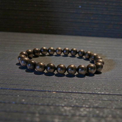 Good Luck Pyrite Bracelet featuring handmade crystal beads designed to attract abundance and positive spiritual energy. This unisex bracelet combines shimmering pyrite stones with artisanal craftsmanship, making it a meaningful gift for both women and men. Lightweight and stylish, it promotes confidence, prosperity, and protection. Perfect for everyday wear or meditation, this abundance bracelet blends healing properties with modern boho jewelry aesthetics.