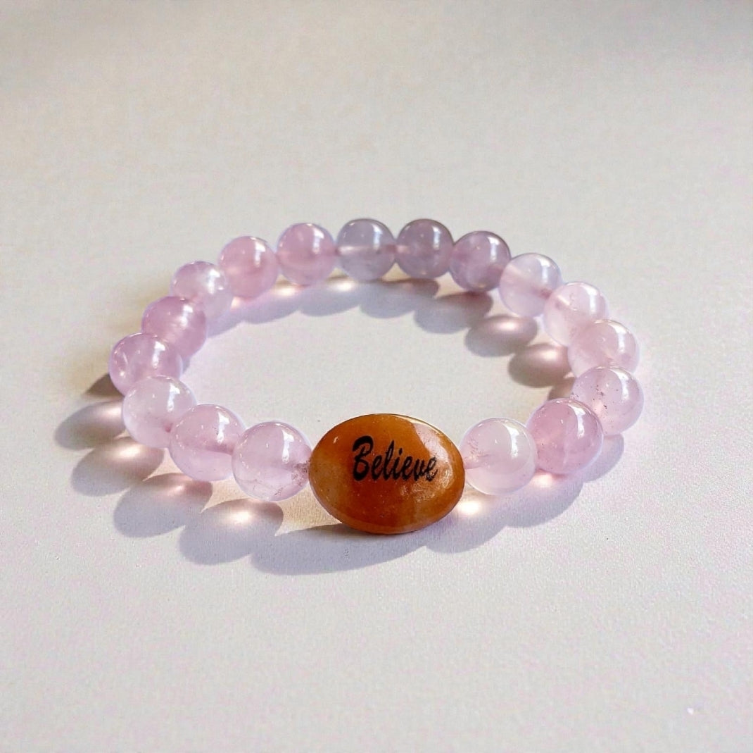 Rose quartz and jasper healing bracelet handcrafted from natural crystal gemstones known for promoting love, grounding, and emotional balance. This statement bracelet blends soft pink rose quartz with earthy jasper stones, creating a bold yet calming jewelry piece. Ideal for crystal healing lovers, meditation, or mindfulness practices, it makes a meaningful gift for women seeking harmony, self-care, and positive energy in everyday life.