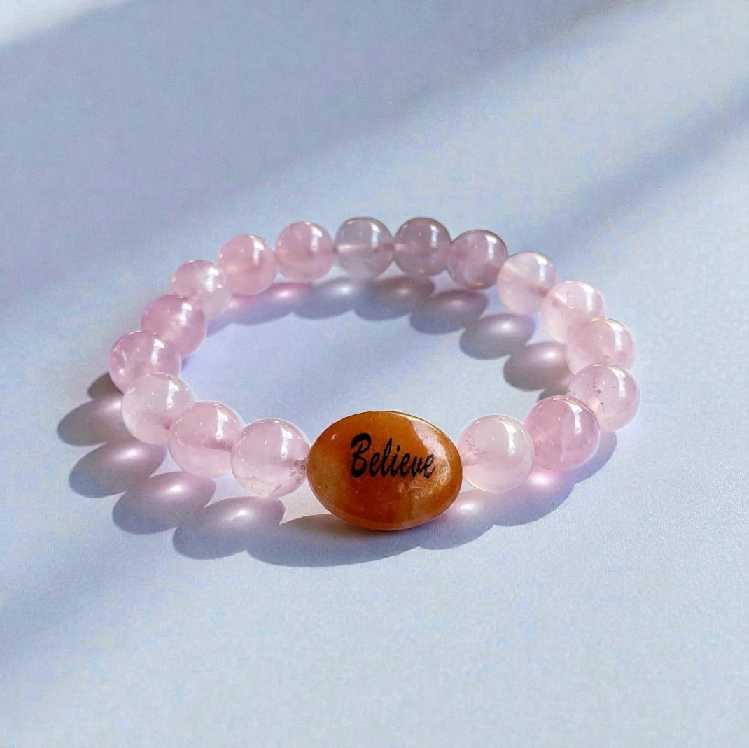 Rose quartz and jasper healing bracelet handcrafted from natural crystal gemstones known for promoting love, grounding, and emotional balance. This statement bracelet blends soft pink rose quartz with earthy jasper stones, creating a bold yet calming jewelry piece. Ideal for crystal healing lovers, meditation, or mindfulness practices, it makes a meaningful gift for women seeking harmony, self-care, and positive energy in everyday life.