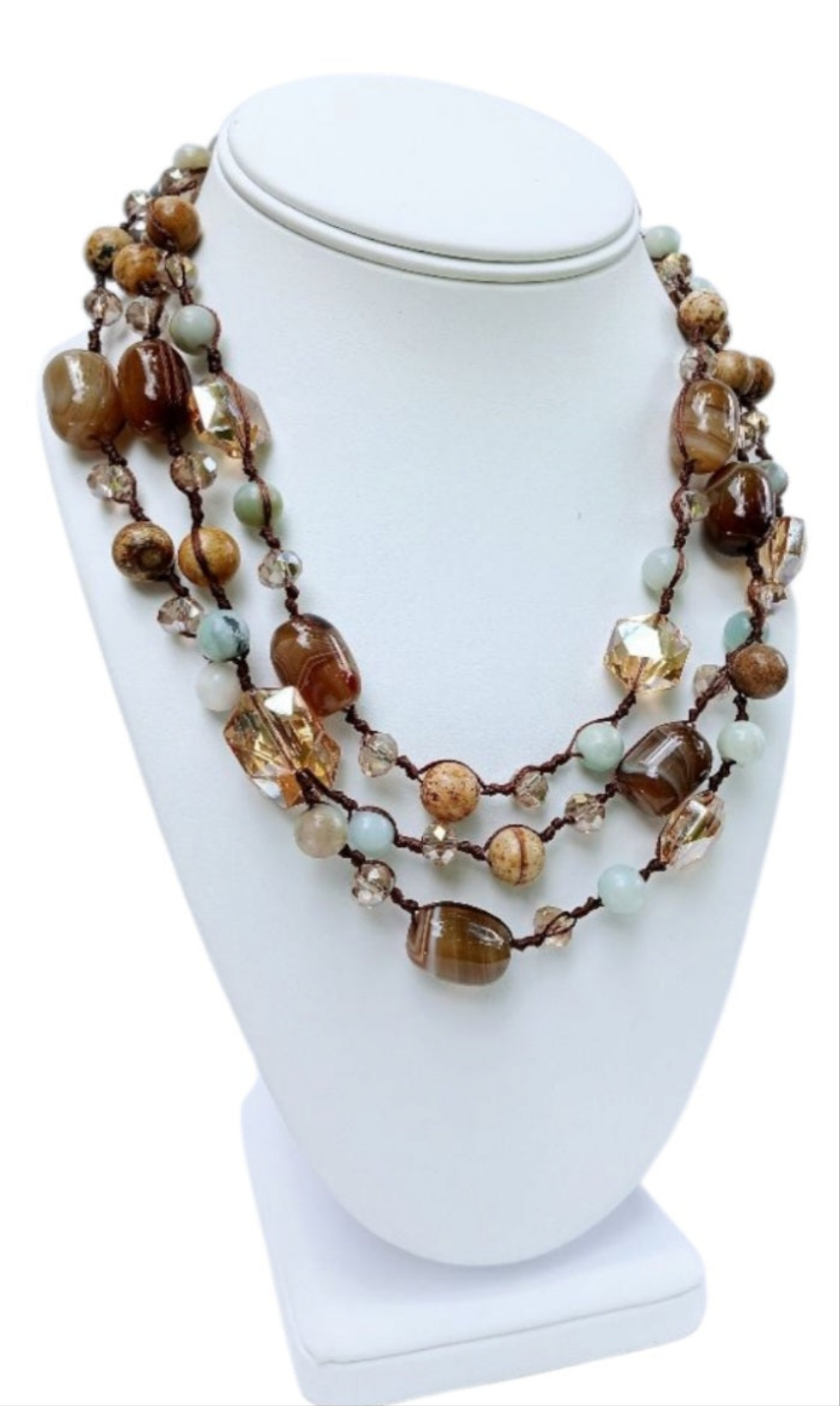 Double knotted 17-inch necklace featuring agate, amazonite, and jasper crystals with a sterling silver clasp. This spiritual healing gemstone jewelry combines natural stones known for their calming and balancing properties. Handmade with care, the necklace offers both style and wellness benefits. Perfect as a thoughtful gift for her, it complements boho and mindful fashion, adding a meaningful touch to any outfit with its earthy, healing vibe
