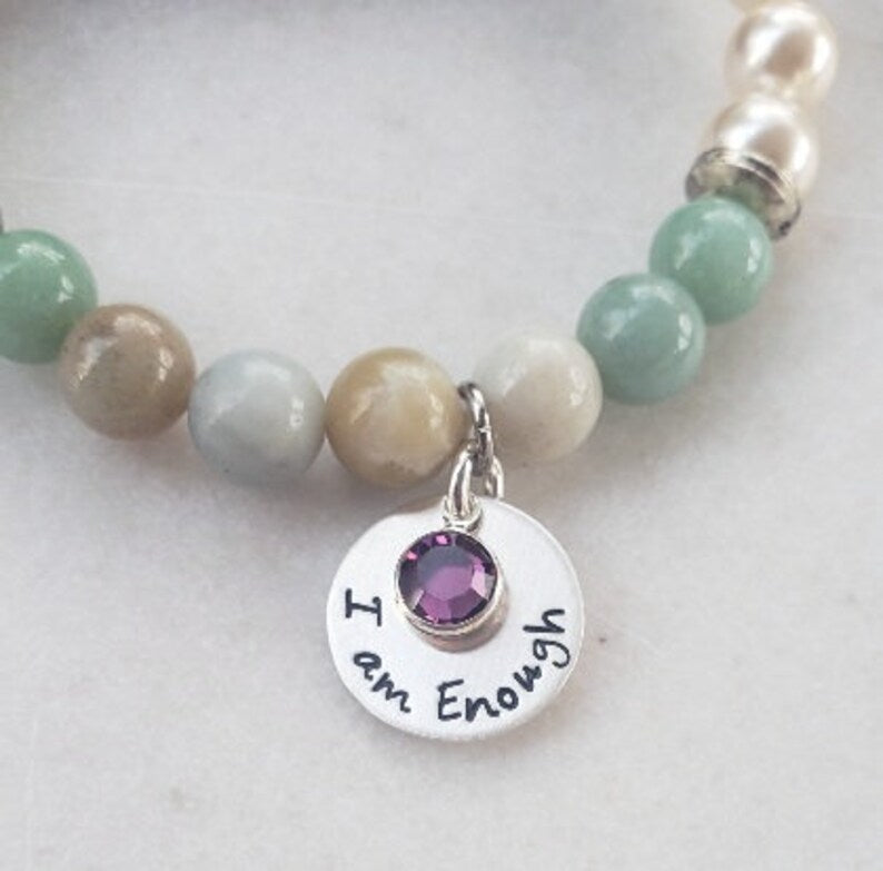 Agate Freshwater Pearl Bracelet designed as an inspirational healing accessory for women, combining green agate stones with delicate freshwater pearls. This empowering zodiac jewelry piece promotes balance, positivity, and emotional strength, making it a thoughtful gift for her. Perfect for daily wear or special occasions, the bracelet blends natural beauty with meaningful symbolism. Stylish and versatile, it complements both casual and elegant outfits.