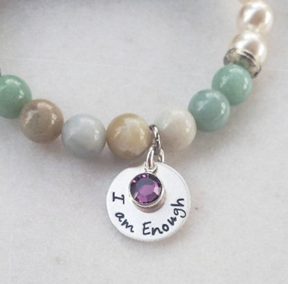 Agate Freshwater Pearl Bracelet designed as an inspirational healing accessory for women, combining green agate stones with delicate freshwater pearls. This empowering zodiac jewelry piece promotes balance, positivity, and emotional strength, making it a thoughtful gift for her. Perfect for daily wear or special occasions, the bracelet blends natural beauty with meaningful symbolism. Stylish and versatile, it complements both casual and elegant outfits.