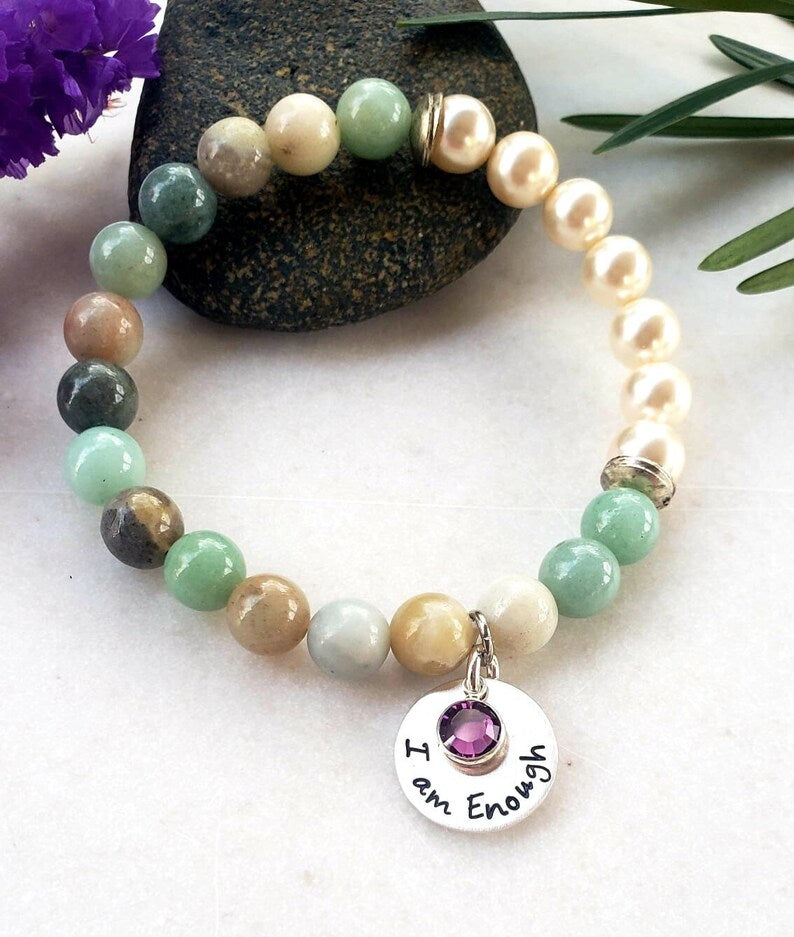 Agate Freshwater Pearl Bracelet designed as an inspirational healing accessory for women, combining green agate stones with delicate freshwater pearls. This empowering zodiac jewelry piece promotes balance, positivity, and emotional strength, making it a thoughtful gift for her. Perfect for daily wear or special occasions, the bracelet blends natural beauty with meaningful symbolism. Stylish and versatile, it complements both casual and elegant outfits.