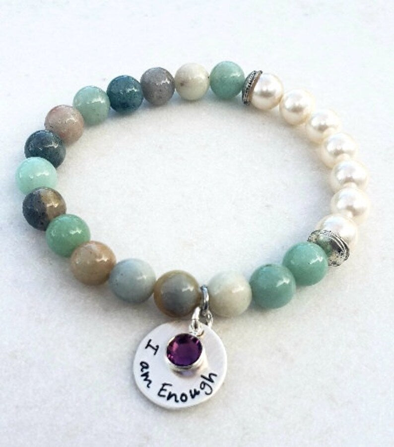 Agate Freshwater Pearl Bracelet designed as an inspirational healing accessory for women, combining green agate stones with delicate freshwater pearls. This empowering zodiac jewelry piece promotes balance, positivity, and emotional strength, making it a thoughtful gift for her. Perfect for daily wear or special occasions, the bracelet blends natural beauty with meaningful symbolism. Stylish and versatile, it complements both casual and elegant outfits.