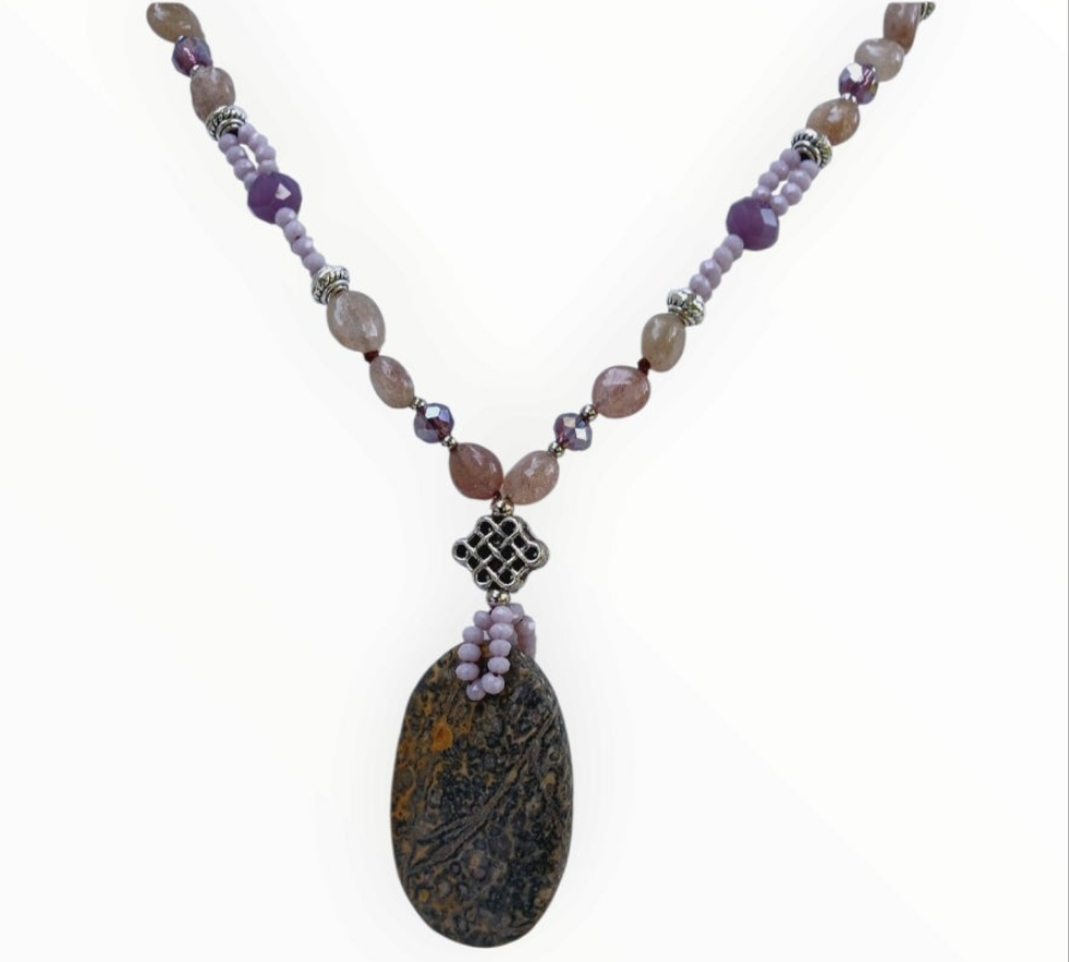 Jasper Necklace for women featuring purple amazonite and African turquoise beads, handcrafted to create a stunning boho healing jewelry piece. This crystal necklace combines natural stones known for their calming and protective properties, making it a thoughtful gift for her. Perfect for everyday wear or special occasions, it adds vibrant color and spiritual energy to any outfit. Stylish, unique, and full of positive vibes for mindful fashion lovers.