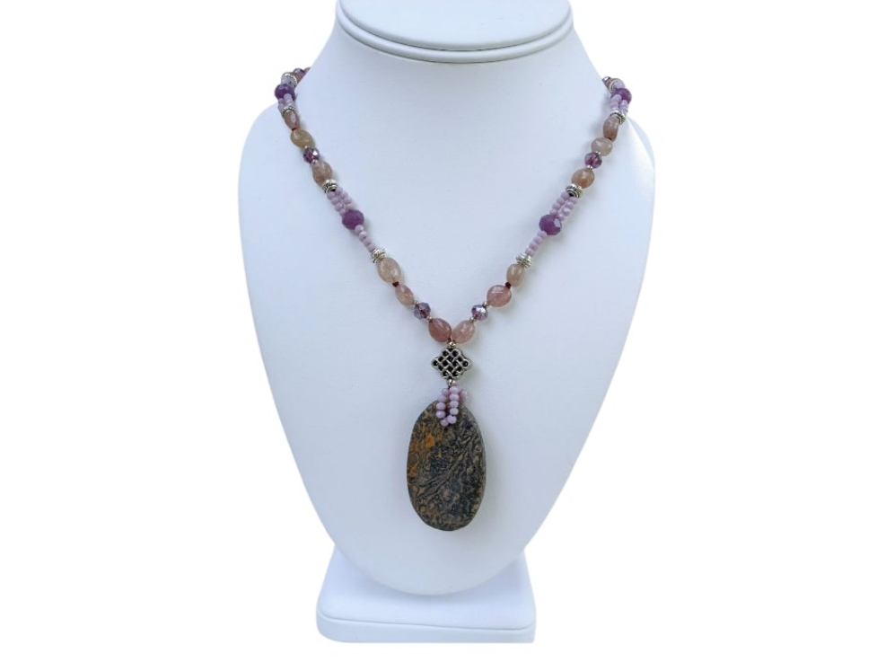 Jasper Necklace for women featuring purple amazonite and African turquoise beads, handcrafted to create a stunning boho healing jewelry piece. This crystal necklace combines natural stones known for their calming and protective properties, making it a thoughtful gift for her. Perfect for everyday wear or special occasions, it adds vibrant color and spiritual energy to any outfit. Stylish, unique, and full of positive vibes for mindful fashion lovers.