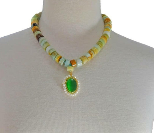 Amazonite Green Pendant Necklace featuring chunky freshwater pearl beads and natural amazonite gemstones in a bold statement design. This handcrafted necklace blends soothing green tones with lustrous pearls for a unique, eye-catching accessory. Perfect gift for women who love artisanal jewelry with a boho-chic vibe. Ideal for adding elegance and natural beauty to casual or formal outfits. Handmade jewelry combining style and positive energy.