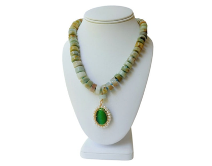 Amazonite Green Pendant Necklace featuring chunky freshwater pearl beads and natural amazonite gemstones in a bold statement design. This handcrafted necklace blends soothing green tones with lustrous pearls for a unique, eye-catching accessory. Perfect gift for women who love artisanal jewelry with a boho-chic vibe. Ideal for adding elegance and natural beauty to casual or formal outfits. Handmade jewelry combining style and positive energy.