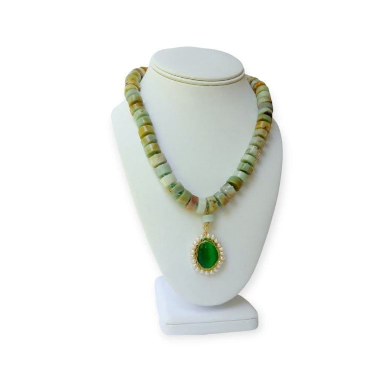 Amazonite Green Pendant Necklace featuring chunky freshwater pearl beads and natural amazonite gemstones in a bold statement design. This handcrafted necklace blends soothing green tones with lustrous pearls for a unique, eye-catching accessory. Perfect gift for women who love artisanal jewelry with a boho-chic vibe. Ideal for adding elegance and natural beauty to casual or formal outfits. Handmade jewelry combining style and positive energy.