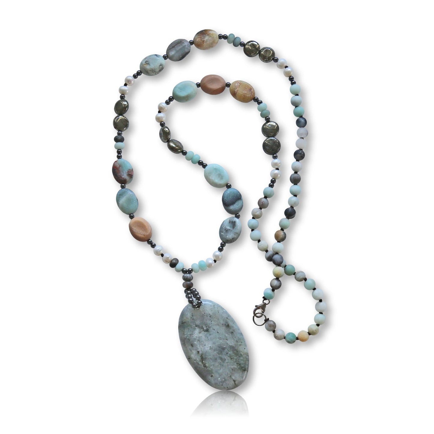Long beaded amazonite necklace for women featuring pearls, labradorite, hematite, and pyrite for a bold statement look. This handcrafted necklace blends soft and earthy tones with natural gemstones known for their beauty and healing properties. Perfect for layering or wearing alone, it adds elegance to boho and everyday styles. A unique gift for her, this versatile necklace brings together calming energy and sophisticated design in one stunning piece.