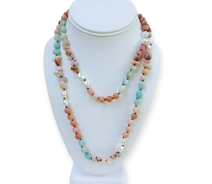 Handmade long necklace featuring natural amazonite and agate gemstones in green and blue hues, designed as a vintage-inspired statement crystal jewelry piece. This unique accessory blends earthy elegance with artisanal craftsmanship, perfect for women who appreciate handcrafted gemstone jewelry. Ideal as a Christmas gift for her, it adds a pop of color and spiritual energy to any outfit, suitable for both casual and formal occasions.
