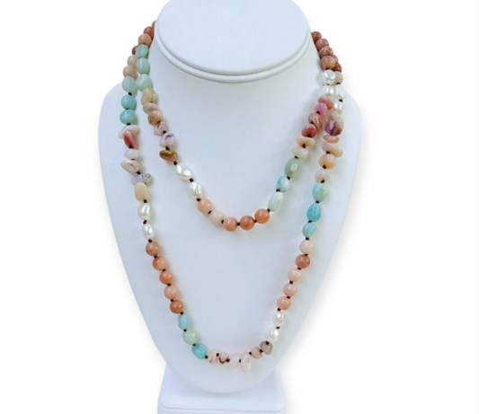Handmade long necklace featuring natural amazonite and agate gemstones in green and blue hues, designed as a vintage-inspired statement crystal jewelry piece. This unique accessory blends earthy elegance with artisanal craftsmanship, perfect for women who appreciate handcrafted gemstone jewelry. Ideal as a Christmas gift for her, it adds a pop of color and spiritual energy to any outfit, suitable for both casual and formal occasions.