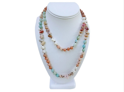 Handmade long necklace featuring natural amazonite and agate gemstones in green and blue hues, designed as a vintage-inspired statement crystal jewelry piece. This unique accessory blends earthy elegance with artisanal craftsmanship, perfect for women who appreciate handcrafted gemstone jewelry. Ideal as a Christmas gift for her, it adds a pop of color and spiritual energy to any outfit, suitable for both casual and formal occasions.