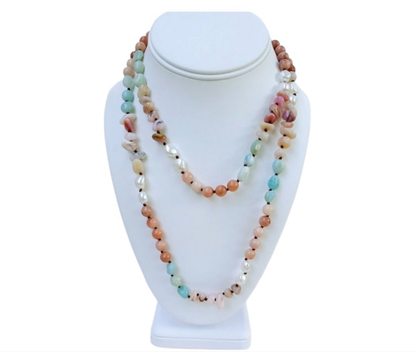 Handmade long necklace featuring natural amazonite and agate gemstones in green and blue hues, designed as a vintage-inspired statement crystal jewelry piece. This unique accessory blends earthy elegance with artisanal craftsmanship, perfect for women who appreciate handcrafted gemstone jewelry. Ideal as a Christmas gift for her, it adds a pop of color and spiritual energy to any outfit, suitable for both casual and formal occasions.